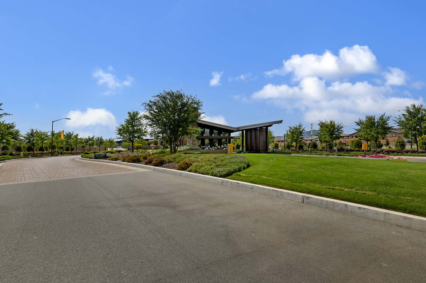 Street view of The VuePoint and the event lawn at Altis