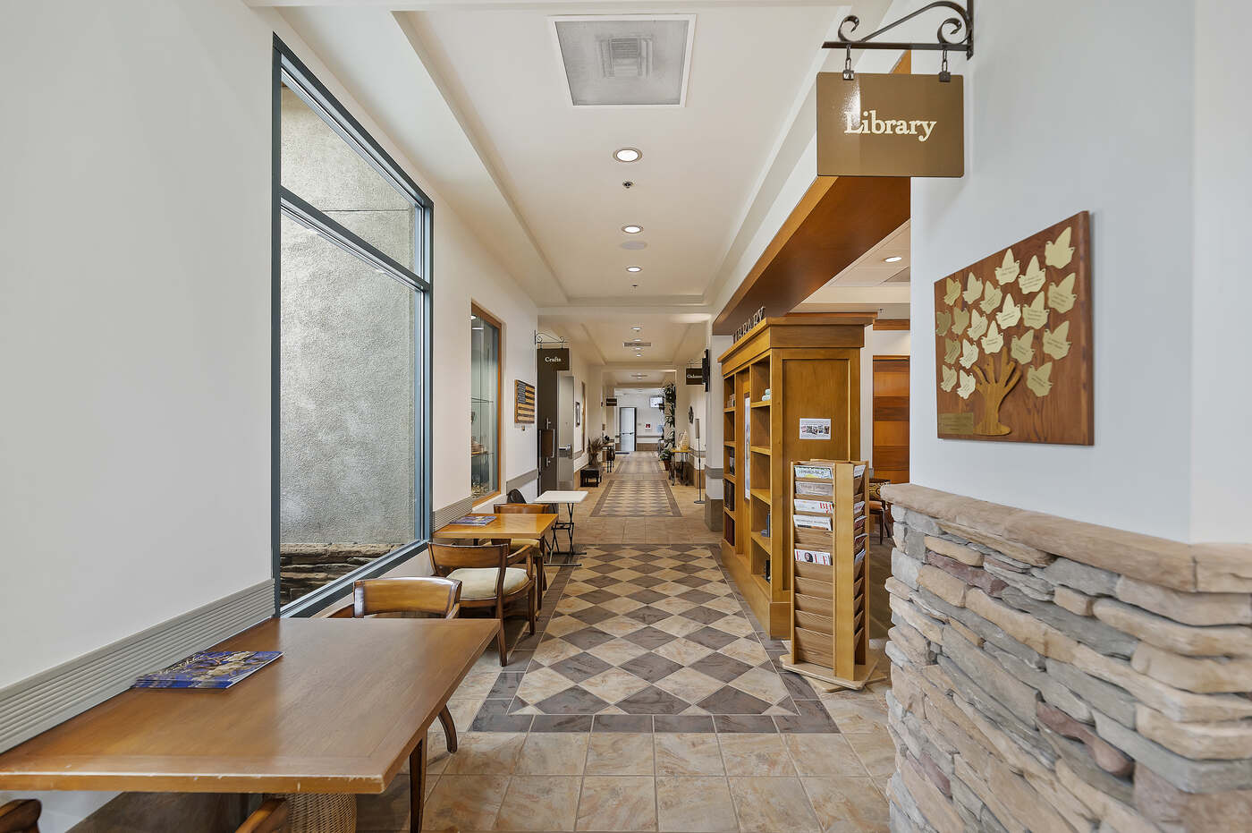 Clubhouse corridor leading to the library at Solera at Oak Valley Greens