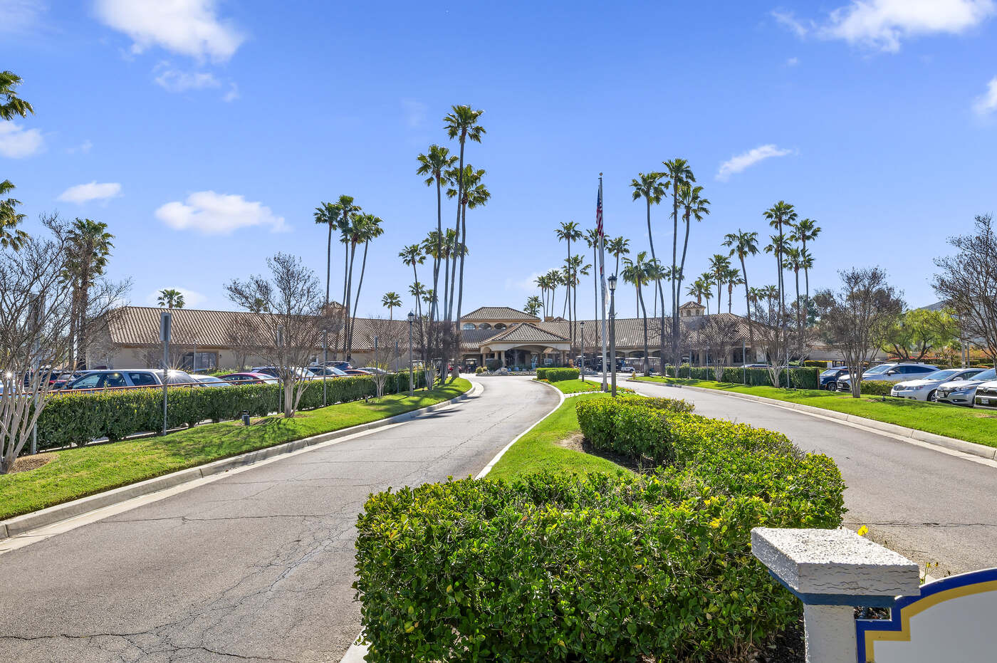 Palm-lined approach to the main clubhouse at Sun Lakes Country Club