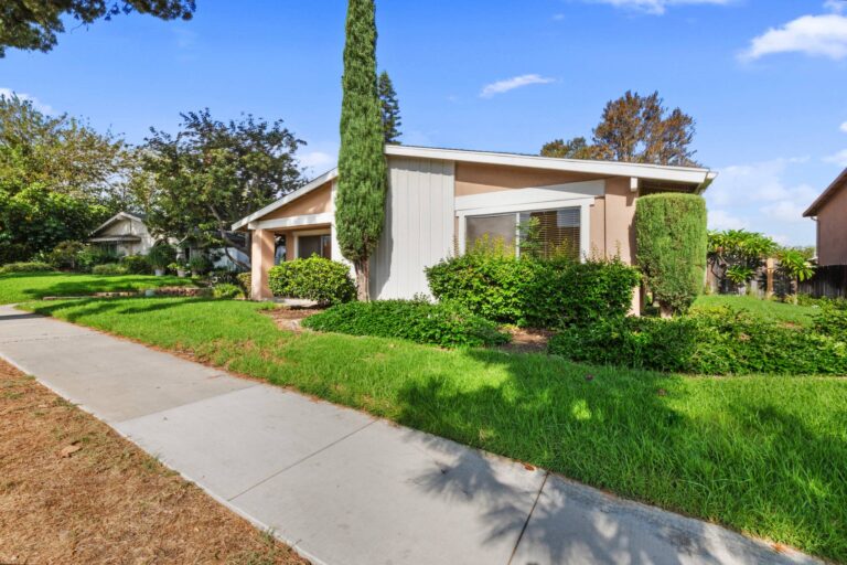1194 Border Ave #A, Corona — front exterior of the single-story end-unit condo with lawn and walkway
