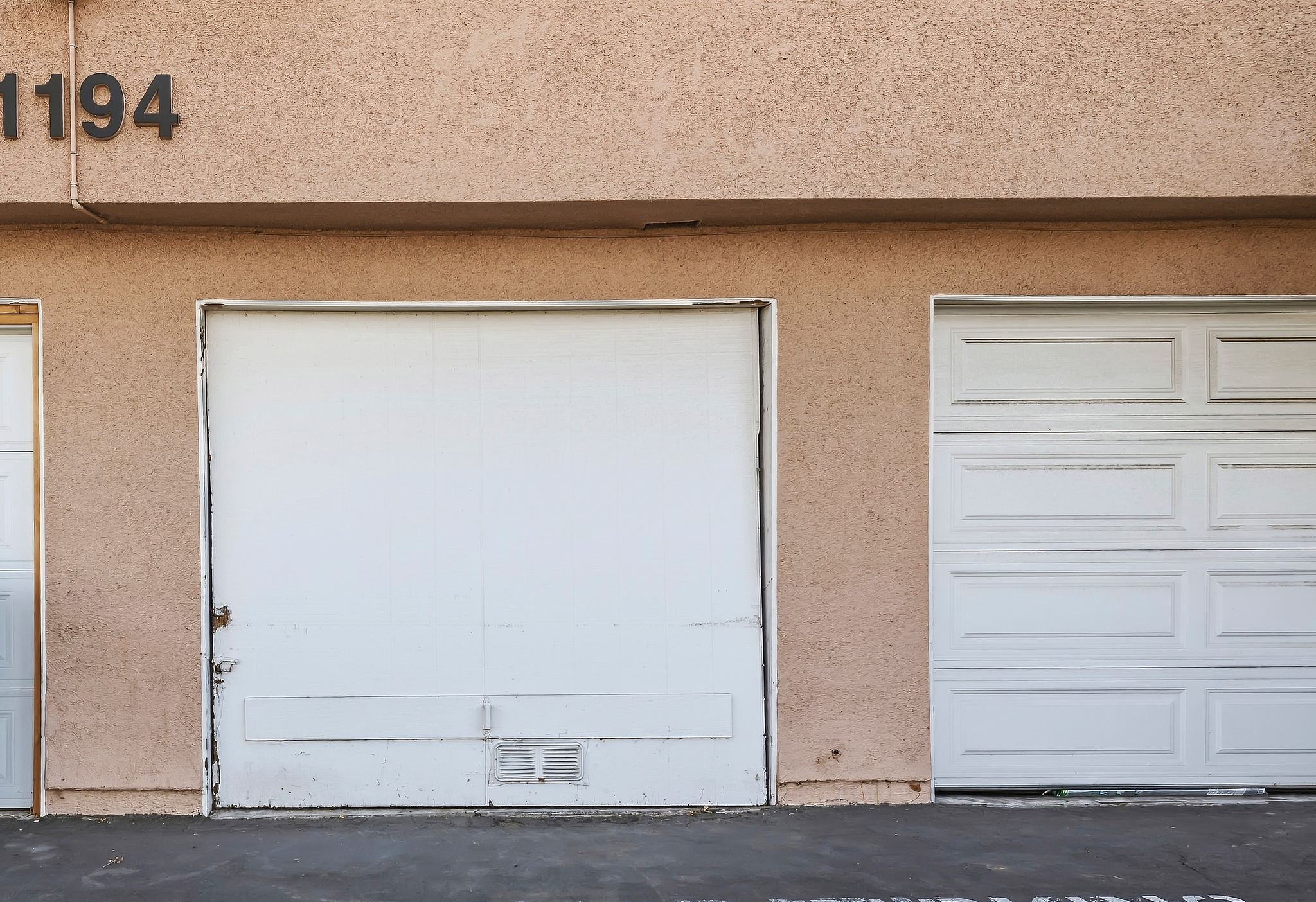 One-car garage with the house number 1194 | 1194 Border Ave #A, Corona