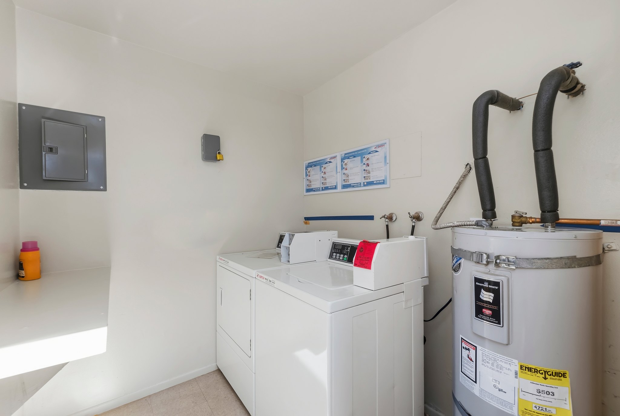 Laundry room with washer, dryer and water heater | 1194 Border Ave #A, Corona