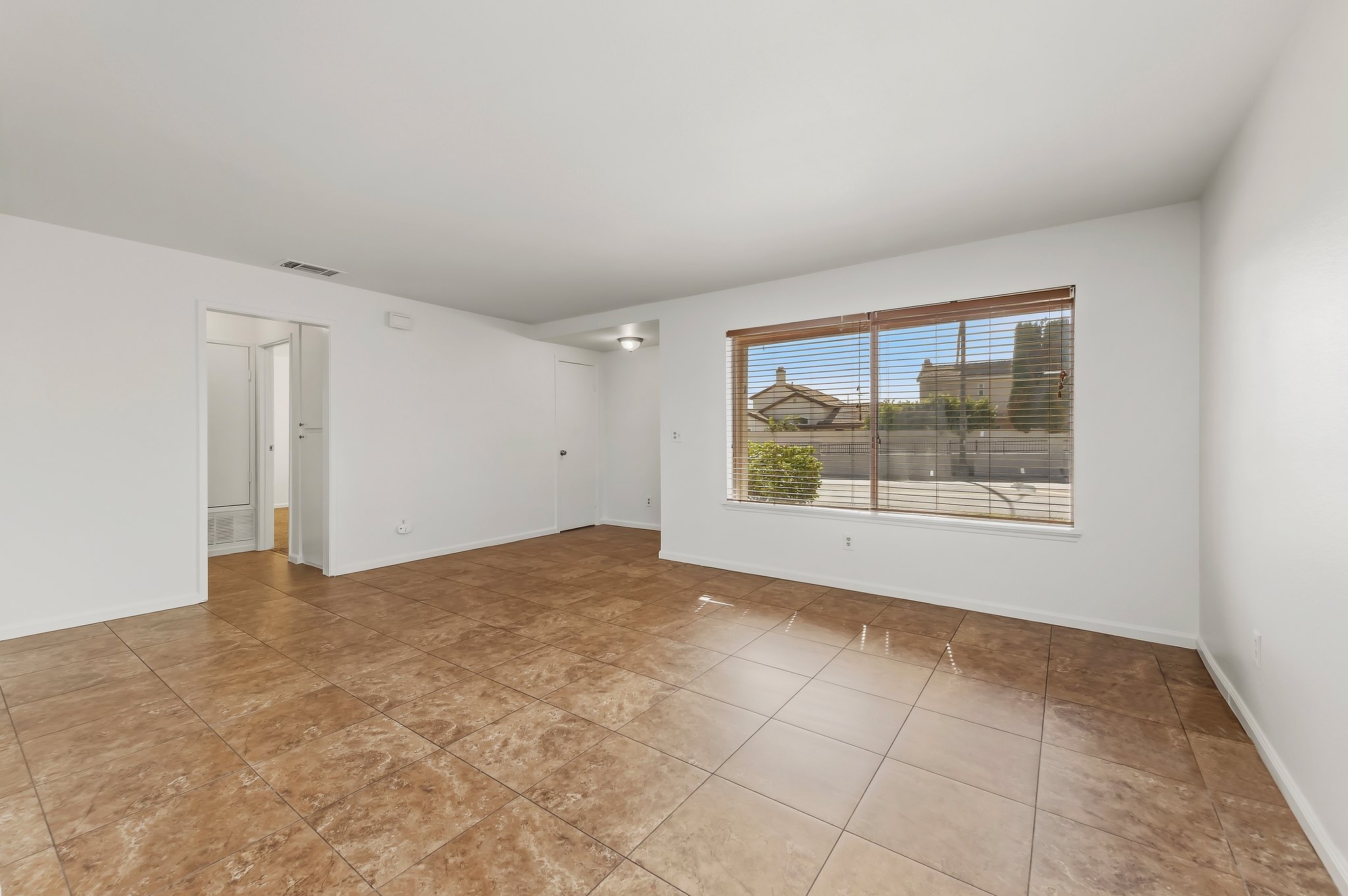 Living room looking toward the hallway and bedrooms | 1194 Border Ave #A, Corona
