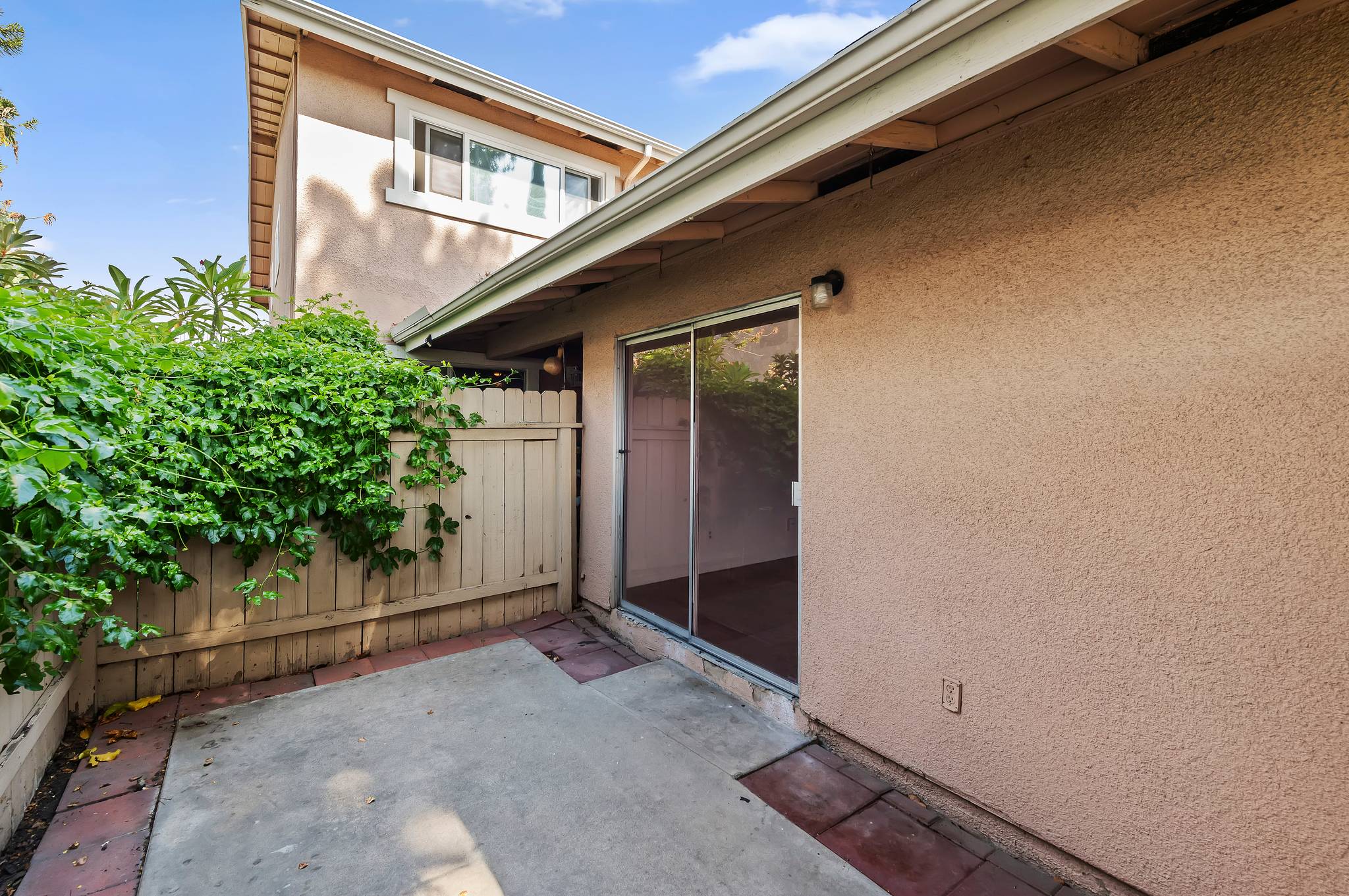 Fenced patio with slider into the home | 1194 Border Ave #A, Corona