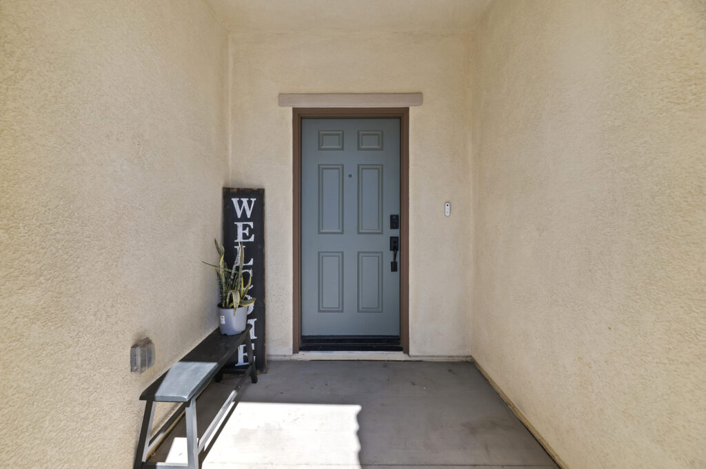 Covered front entry with a bench