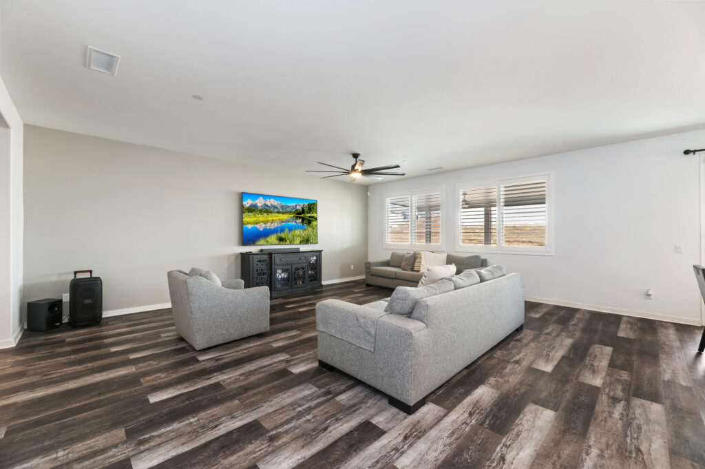 Open-plan living room looking toward the kitchen