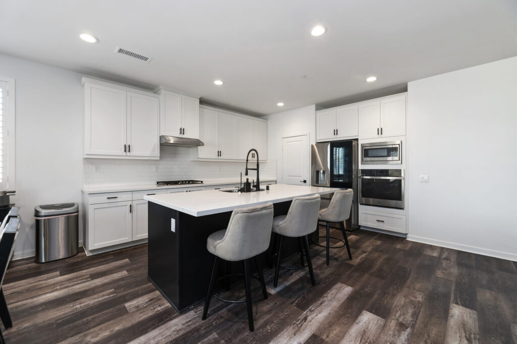 Kitchen with stainless appliances and built-in ovens