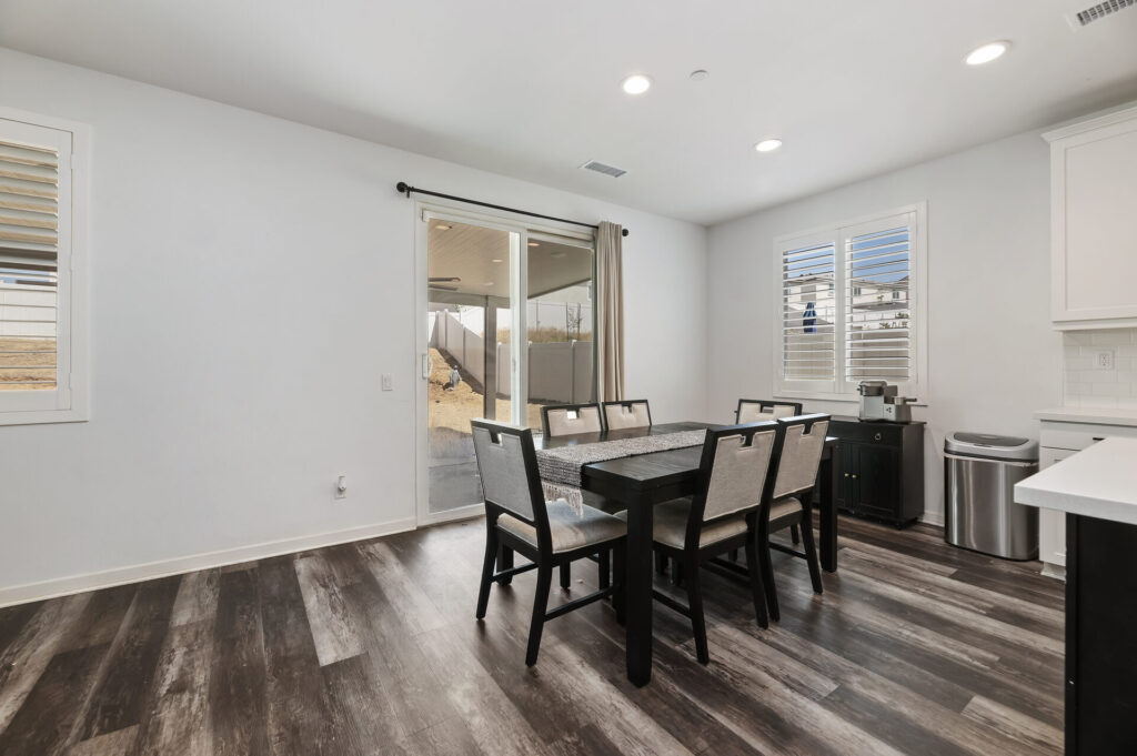 Dining area beside sliding doors to the backyard