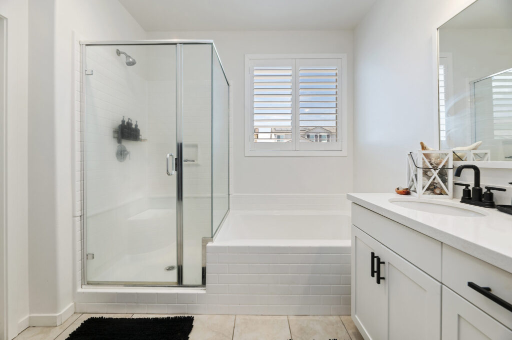Primary bathroom with a soaking tub and separate shower