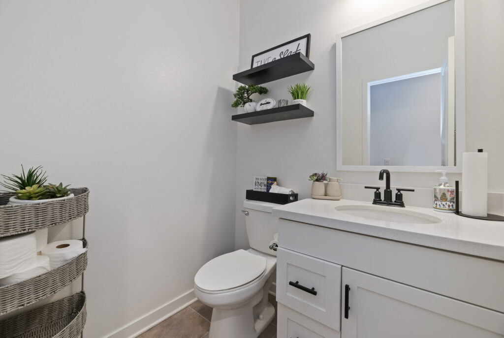 Powder room with a quartz counter