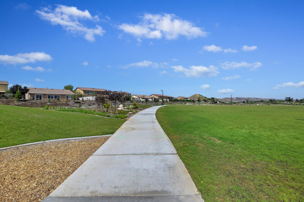 Paved walking path through the park | Olivewood, Beaumont