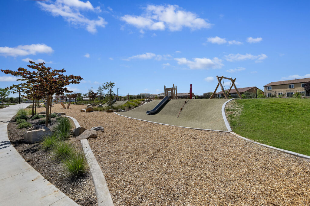 Hillside slide at the playground | Olivewood, Beaumont