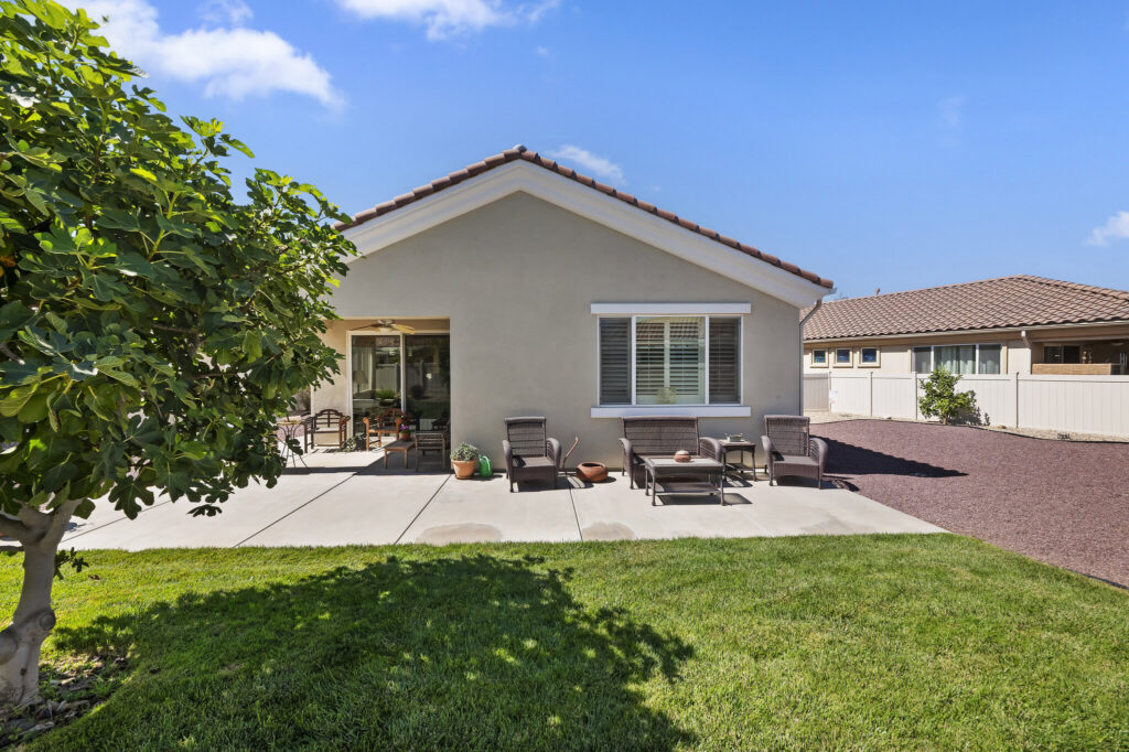 1142 Wisteria Way, Beaumont — backyard with lawn and covered patio