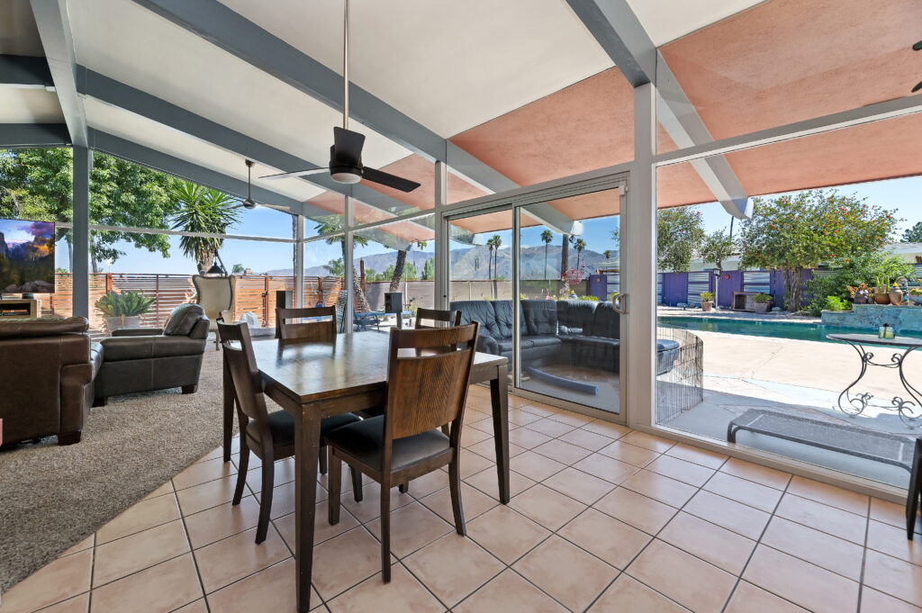 1717 Terrace Dr, Hemet — dining area with tile floor and sliding glass doors to the pool