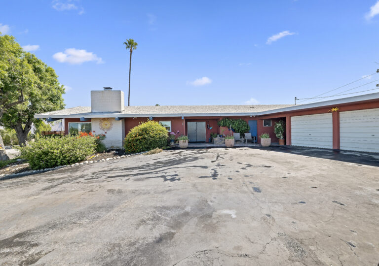 1717 Terrace Dr, Hemet — front exterior of the mid-century ranch home with circular drive and garage