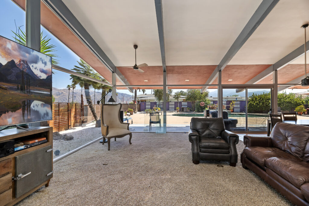 1717 Terrace Dr, Hemet — great room with floor-to-ceiling glass looking out to the pool