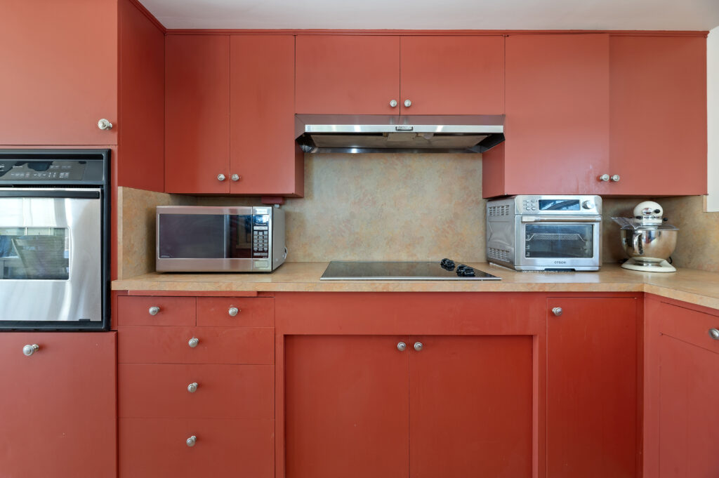 1717 Terrace Dr, Hemet — kitchen with wall oven, cooktop and range hood