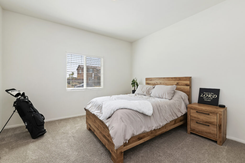 2153 El Nido Ave, Perris — secondary bedroom with carpet and window
