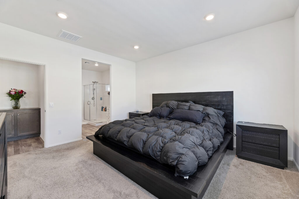 2153 El Nido Ave, Perris — downstairs primary suite with en-suite bathroom