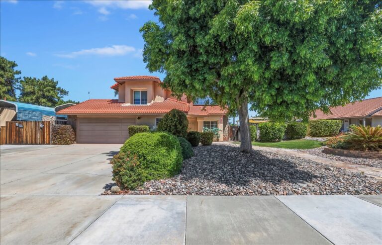 42138 Bancroft Way, Hemet — front exterior of the two-story home with tile roof and driveway