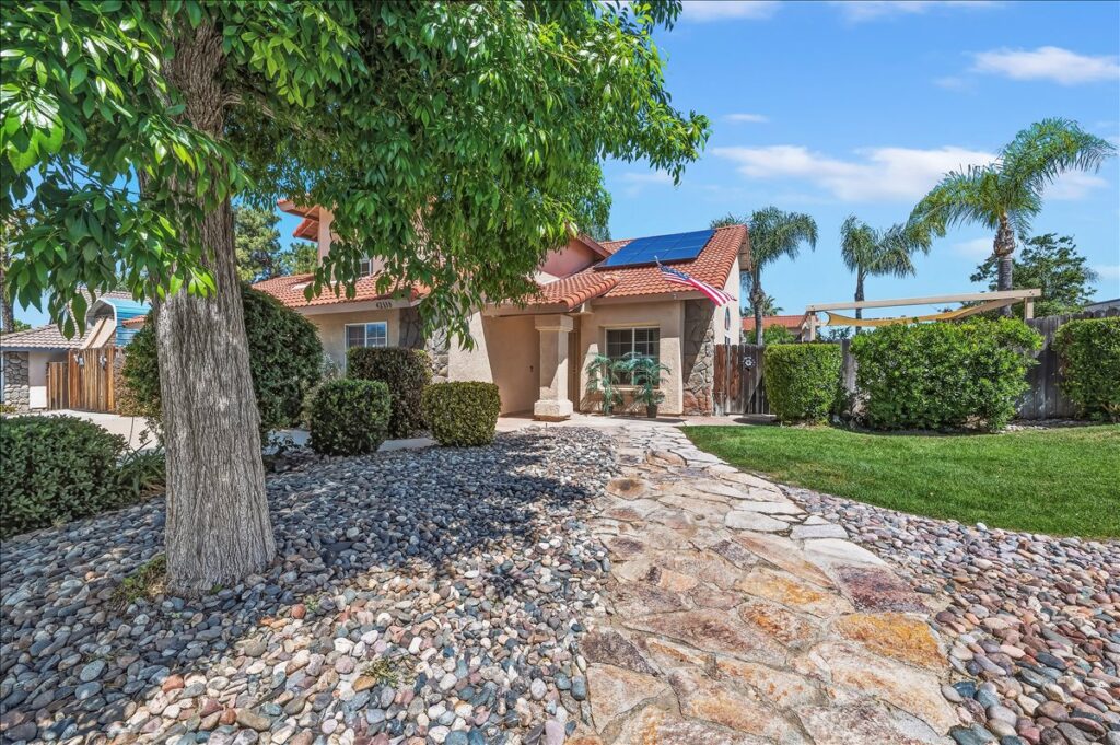42138 Bancroft Way, Hemet — front yard, stone walkway and rooftop solar panels